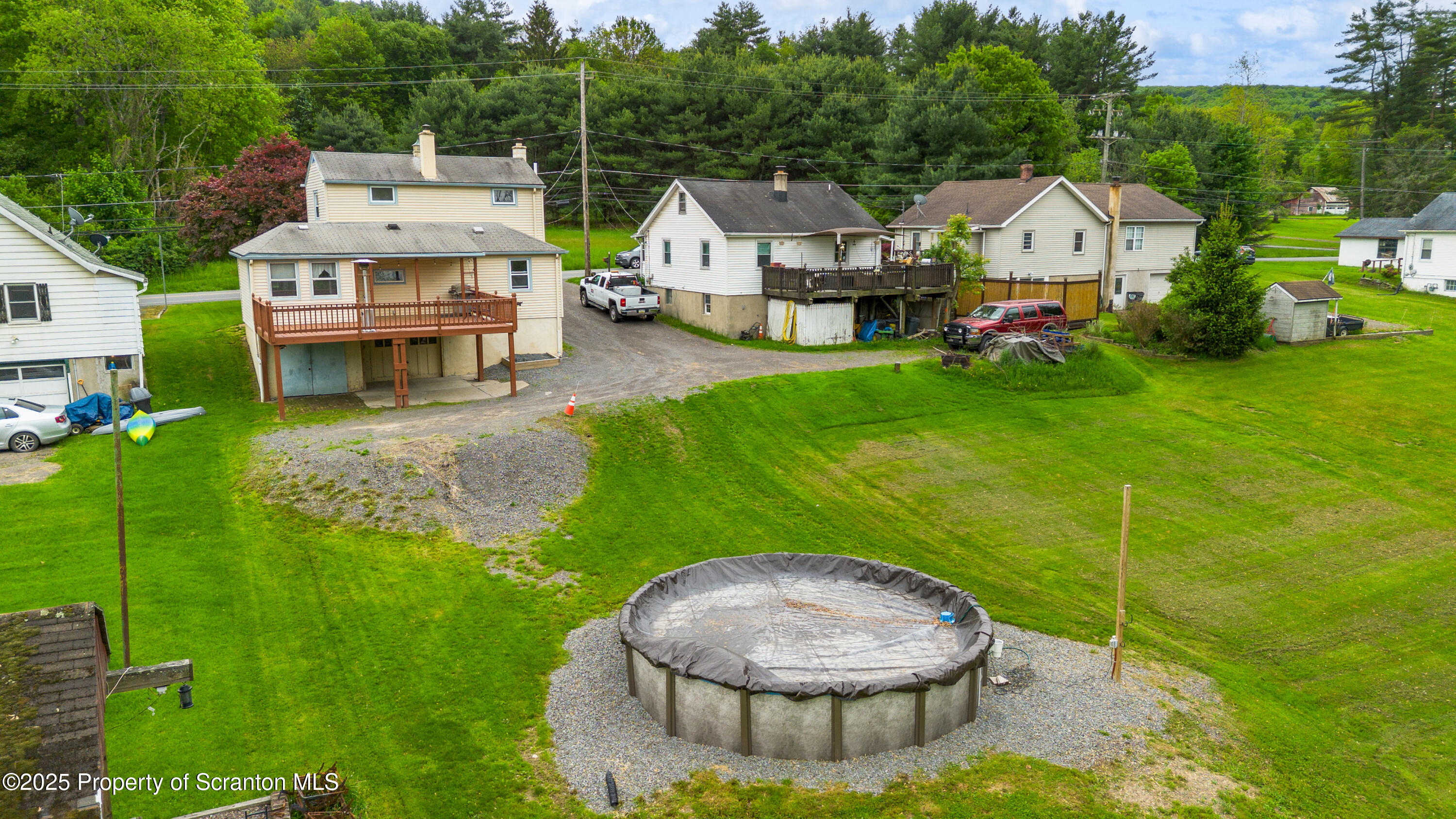 730 Chase Road Shavertown, PA 18708 - Photo 12 of 43 an aerial view of a house with garden space and street view