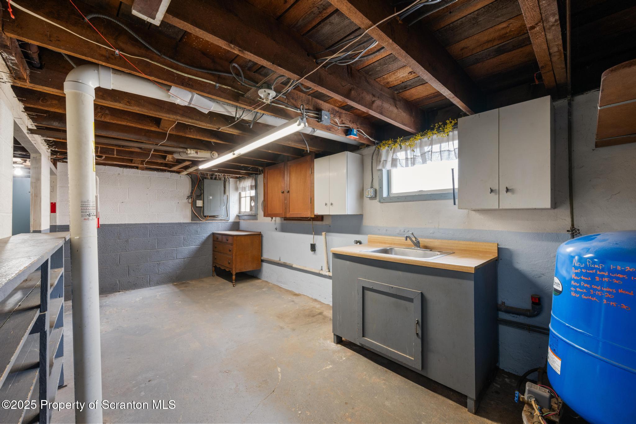 730 Chase Road Shavertown, PA 18708 - Photo 35 of 43 a utility room with cabinets dryer and washer