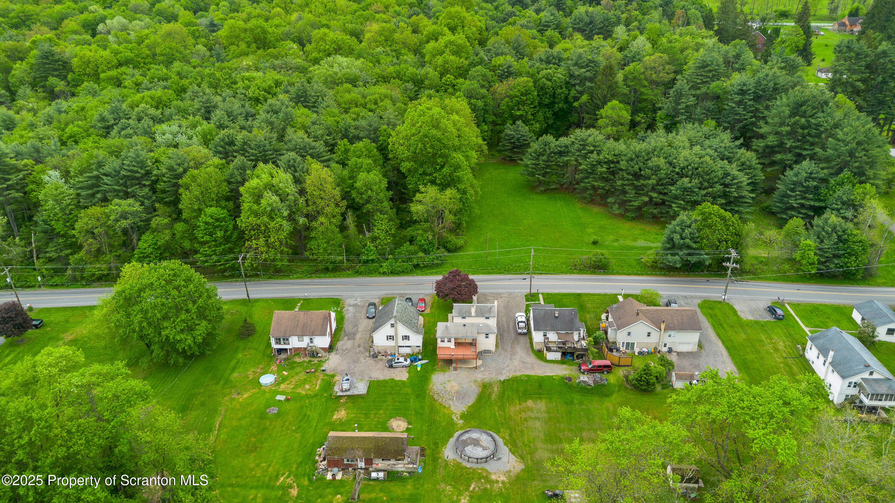 730 Chase Road Shavertown, PA 18708 - Photo 6 of 43 a view of a play ground with swimming pool