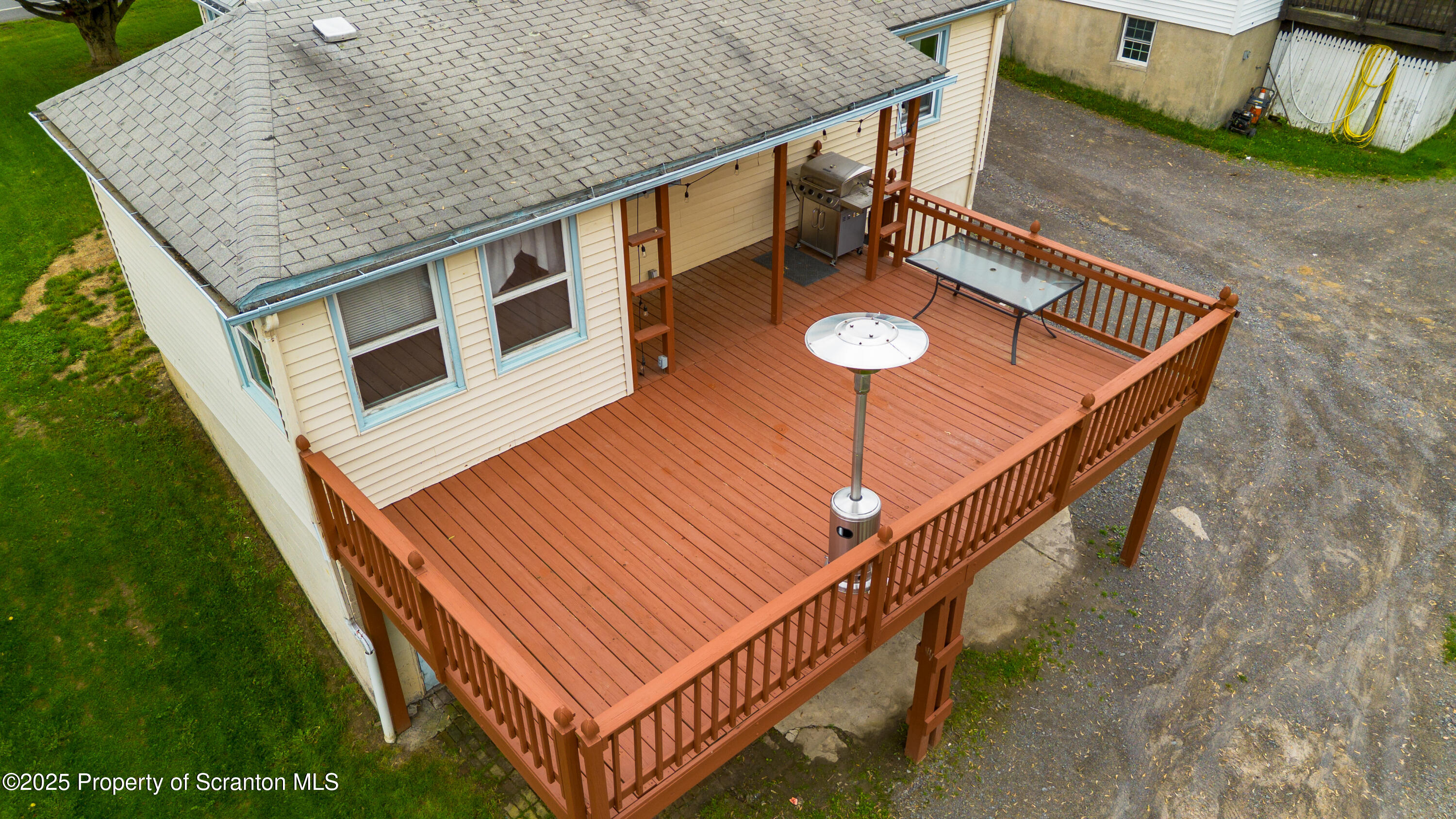 730 Chase Road Shavertown, PA 18708 - Photo 9 of 43 a view of a house with a deck