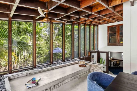 a kitchen with stainless steel appliances granite countertop a refrigerator a sink and a stove