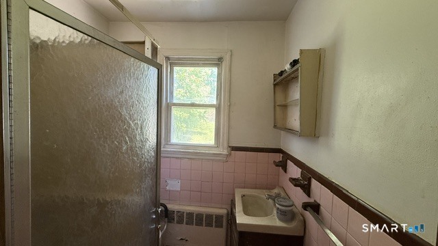 131 Bryden Terrace Hamden, CT 06517 - Photo 12 of 16 a view of front door with chair and a window