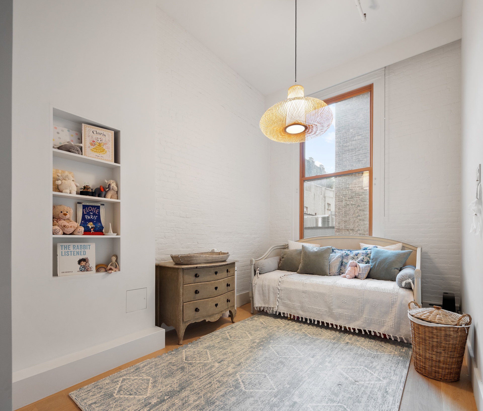 121 Mercer Street, Unit 4 Manhattan, NY 10012 - Photo 11 of 14 a bedroom with furniture and a window