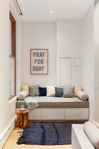 a living room with furniture and a couch