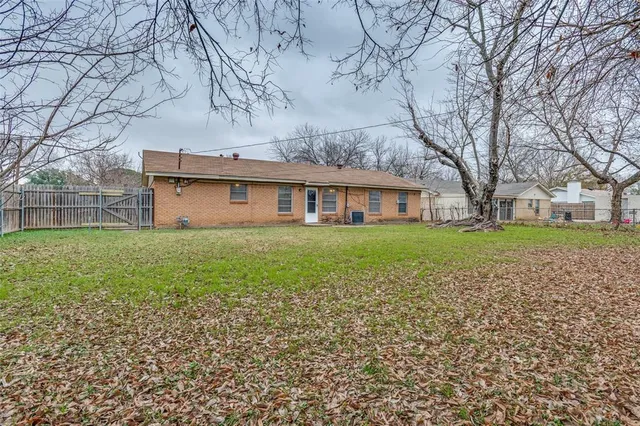 front view of house with a yard