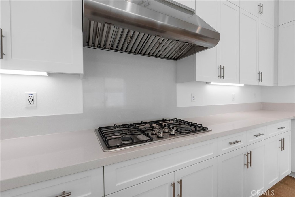 43 Miren Place Arcadia, CA 91007 - Photo 15 of 37 a kitchen with white cabinets and stove