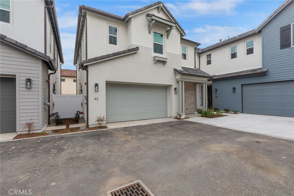 43 Miren Place Arcadia, CA 91007 - Photo 2 of 37 a front view of a house with a garage