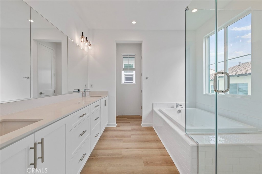 43 Miren Place Arcadia, CA 91007 - Photo 21 of 37 a spacious bathroom with a double vanity sink a mirror and a bathtub