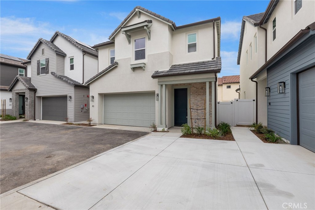 43 Miren Place Arcadia, CA 91007 - Photo 3 of 37 a front view of a house with garden