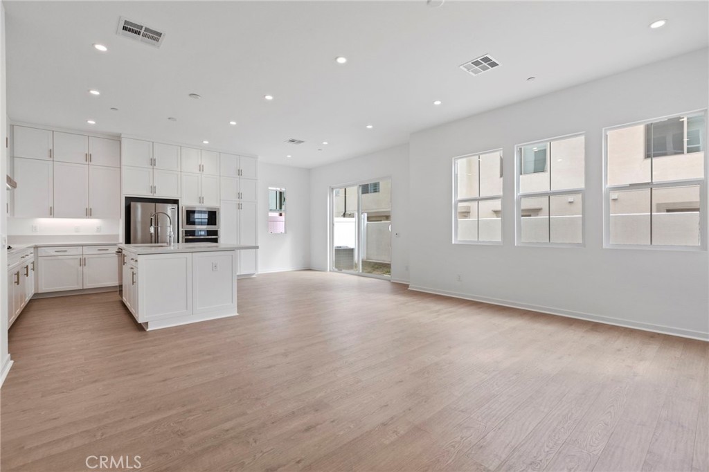 43 Miren Place Arcadia, CA 91007 - Photo 5 of 37 a view of kitchen and kitchen with furniture and refrigerator