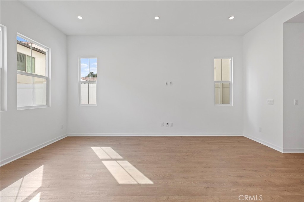 43 Miren Place Arcadia, CA 91007 - Photo 7 of 37 an empty room with wooden floor and windows
