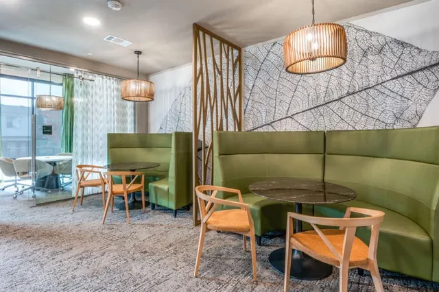 a lamp room with furniture and a chandelier