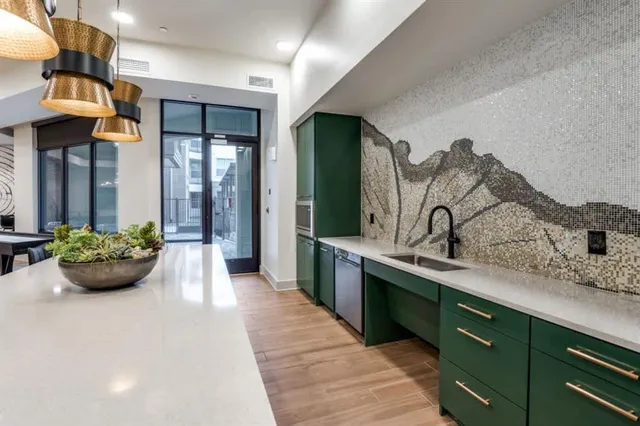 a spacious bathroom with a sink and mirror