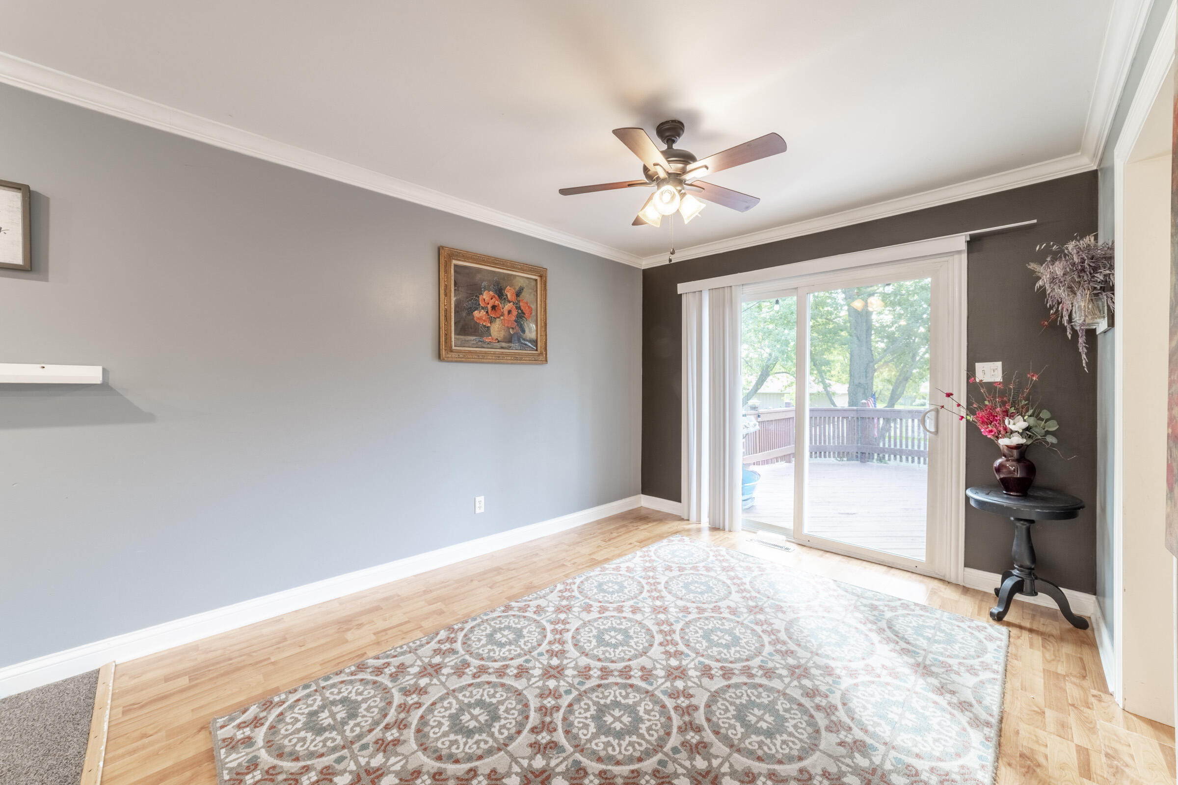 6331 Broughton Avenue Portage, IN 46368 - Photo 15 of 51 a bedroom with a bed and a chandelier