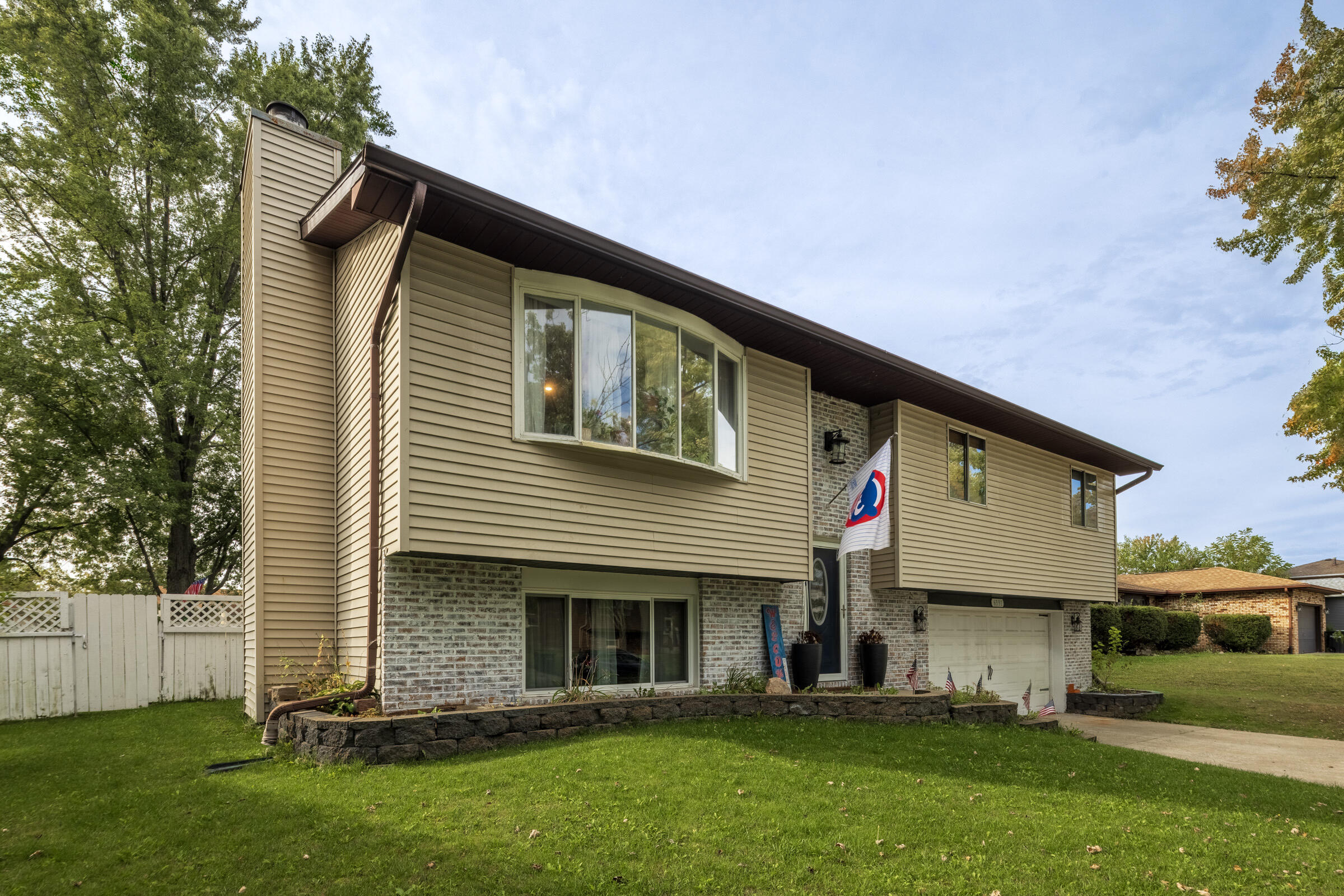 6331 Broughton Avenue Portage, IN 46368 - Photo 2 of 51 a view of house with backyard
