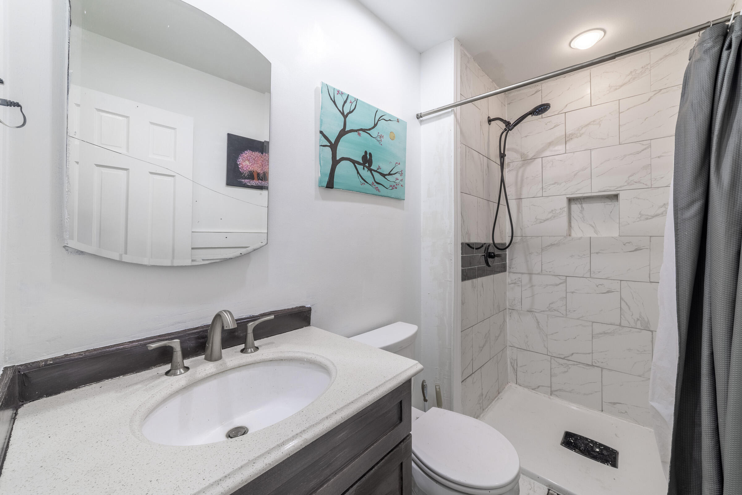 6331 Broughton Avenue Portage, IN 46368 - Photo 28 of 51 a bathroom with a sink toilet and shower