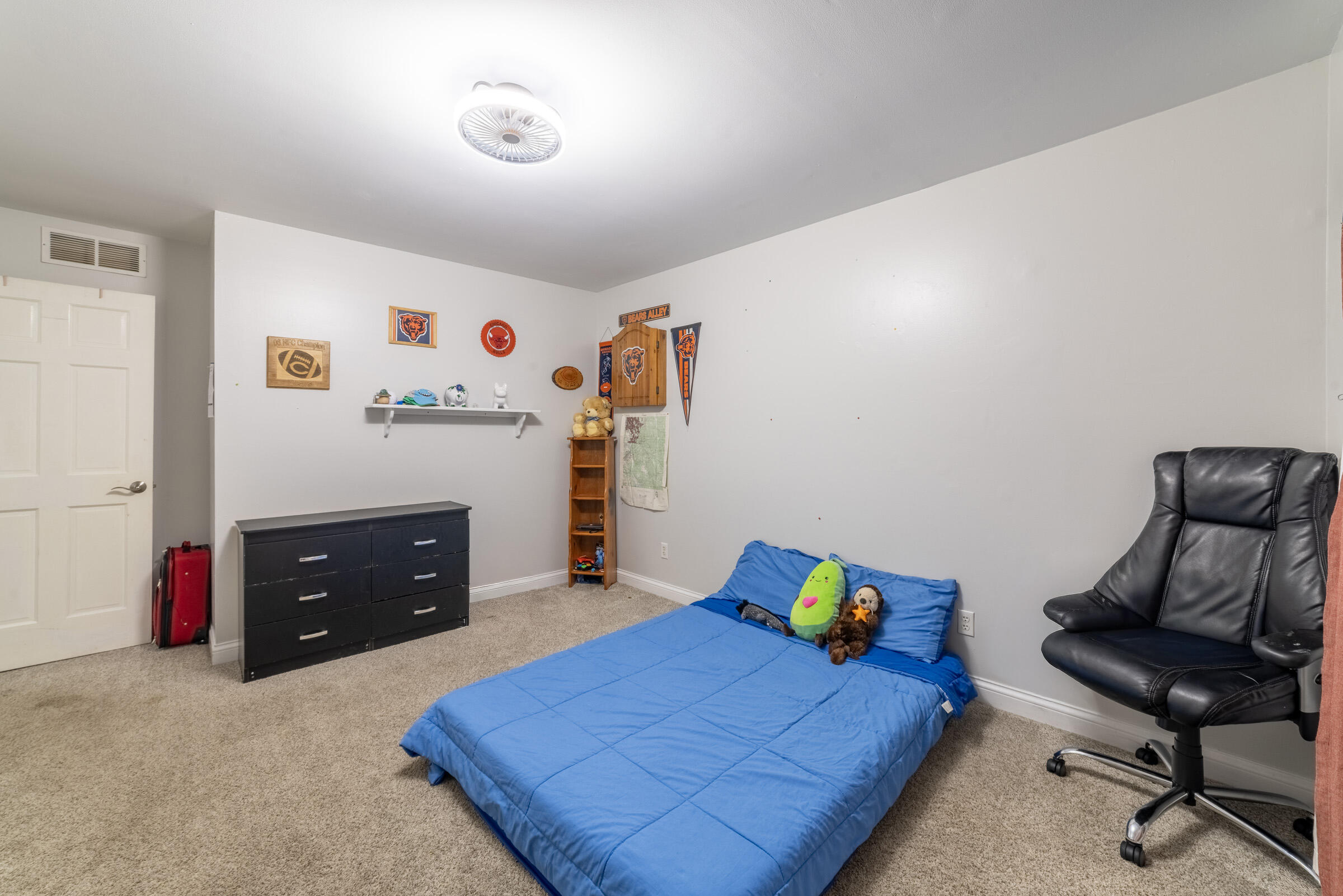 6331 Broughton Avenue Portage, IN 46368 - Photo 34 of 51 a bedroom with a bed and furniture