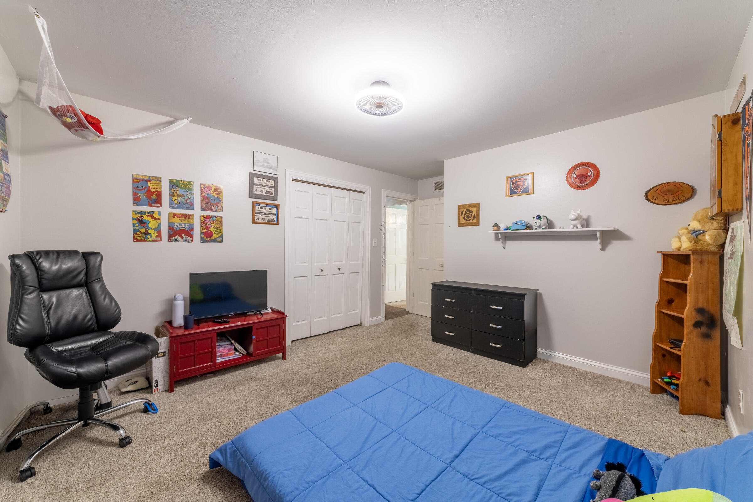 6331 Broughton Avenue Portage, IN 46368 - Photo 35 of 51 a bedroom with furniture and a window