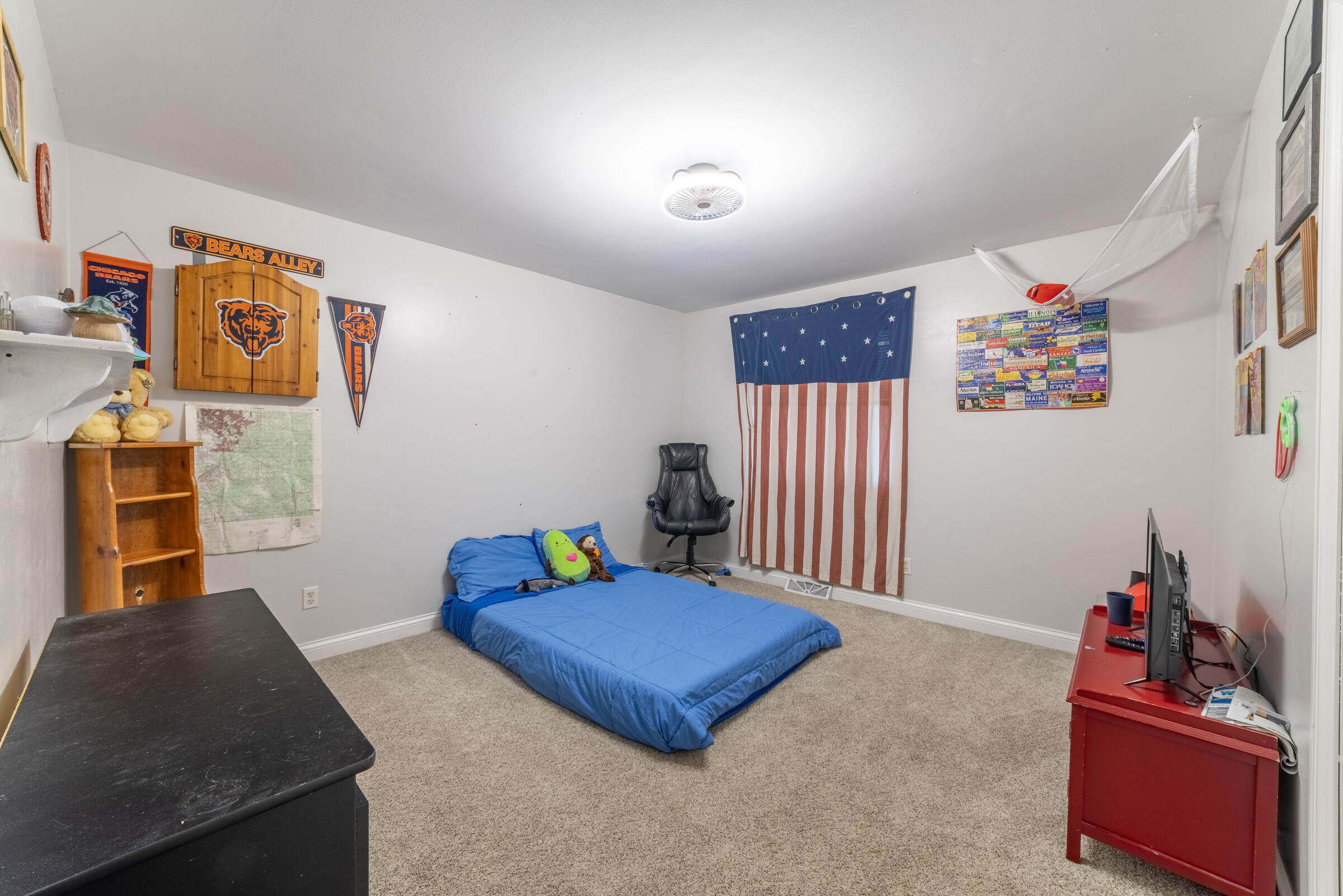 6331 Broughton Avenue Portage, IN 46368 - Photo 36 of 51 a bedroom with furniture and a wooden floor