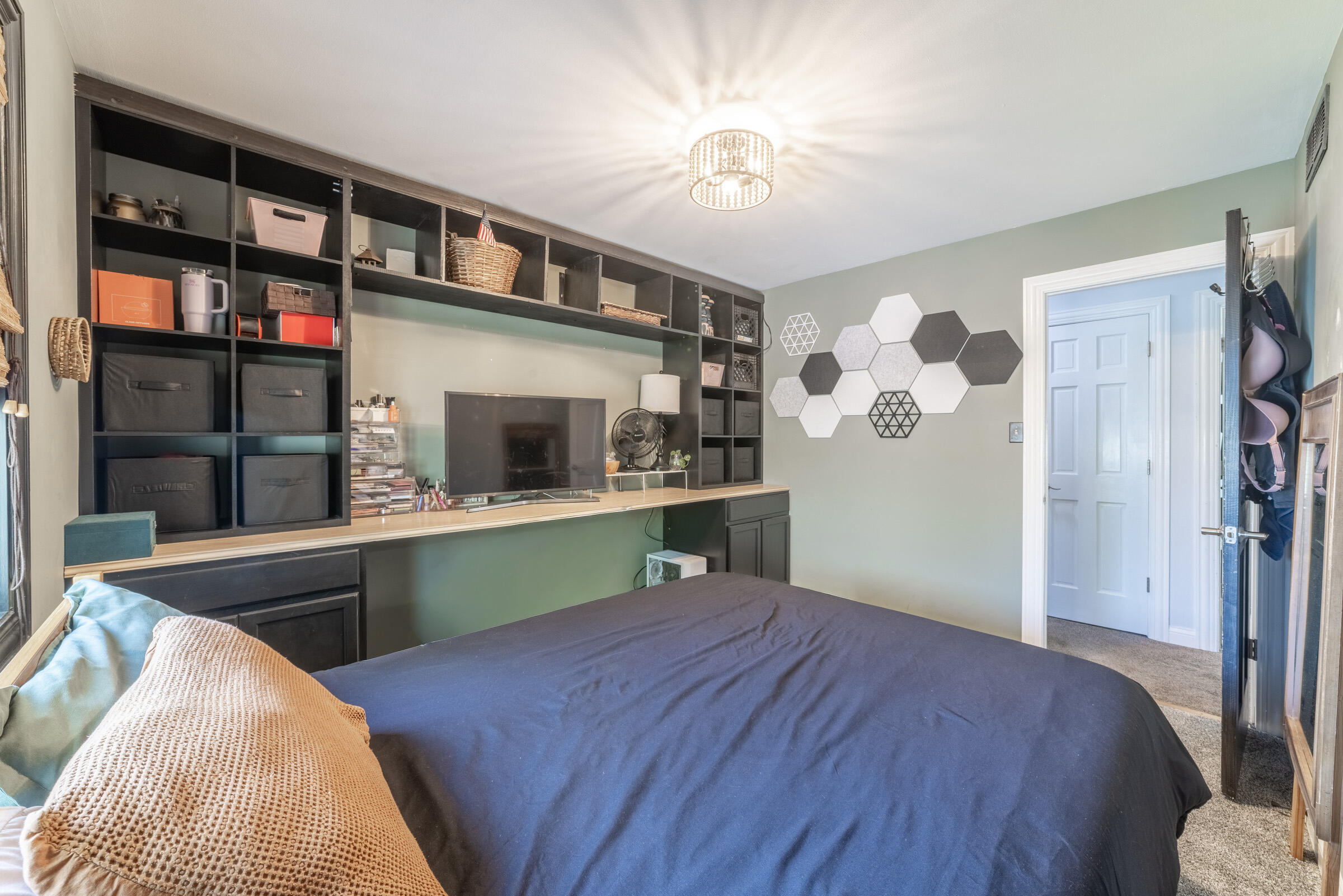 6331 Broughton Avenue Portage, IN 46368 - Photo 38 of 51 a bedroom with a bed and a large window