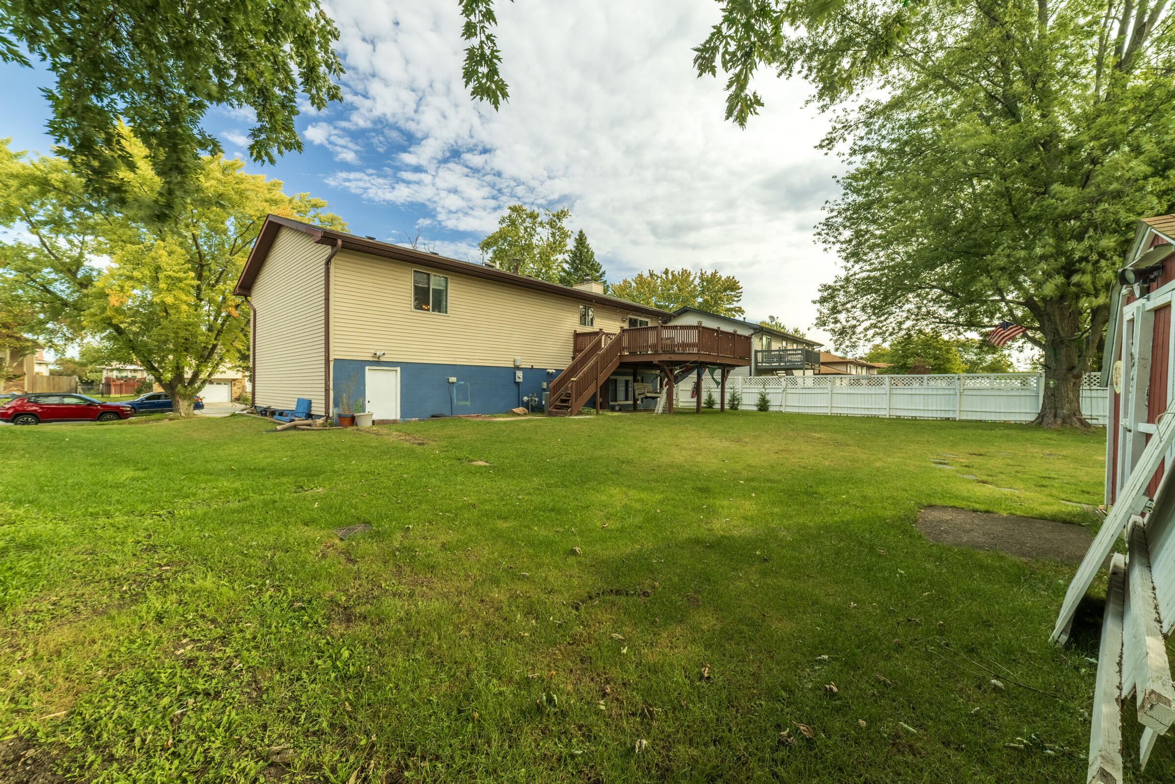 6331 Broughton Avenue Portage, IN 46368 - Photo 44 of 51 a view of a house with a yard