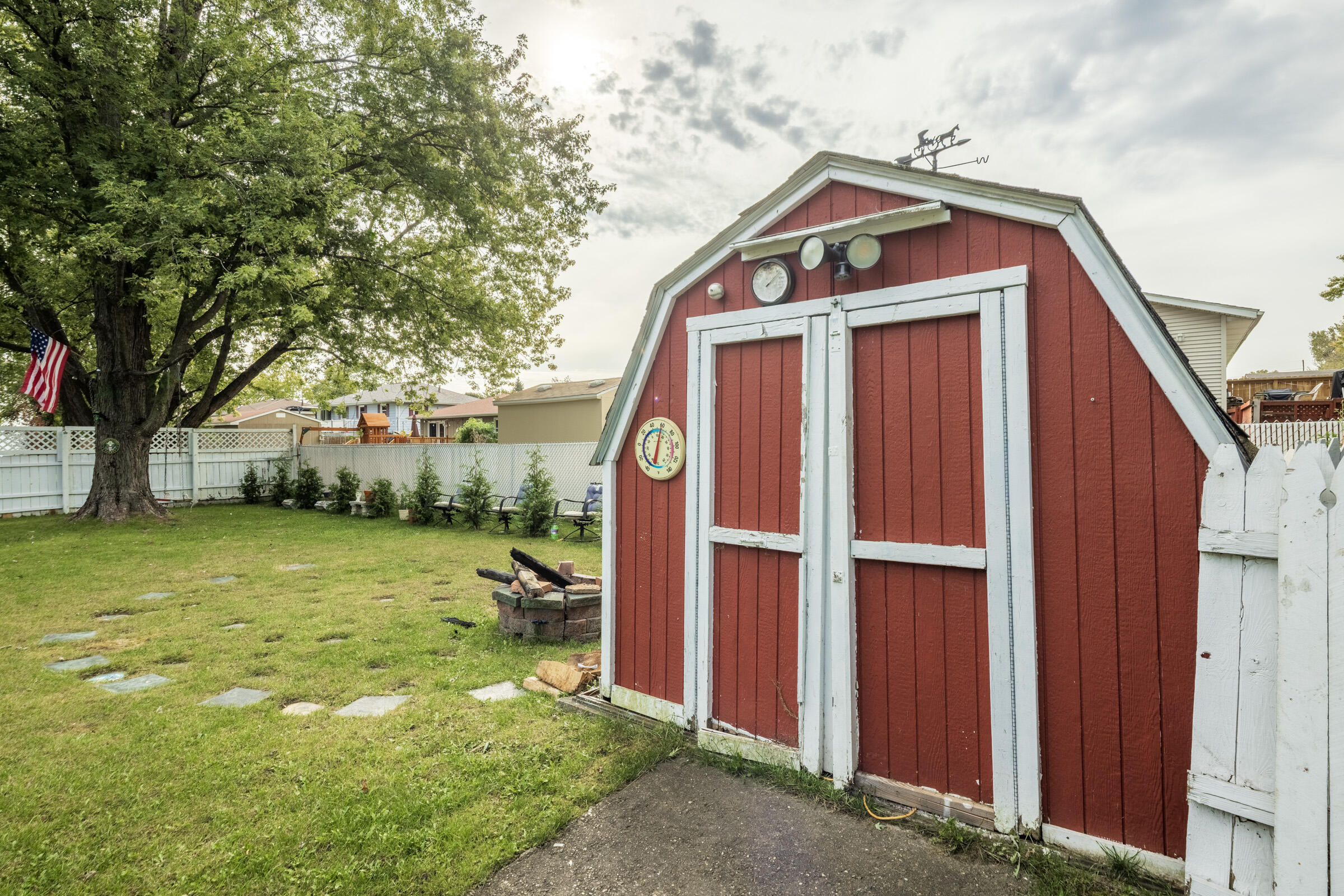6331 Broughton Avenue Portage, IN 46368 - Photo 47 of 51 a front view of a house with garden
