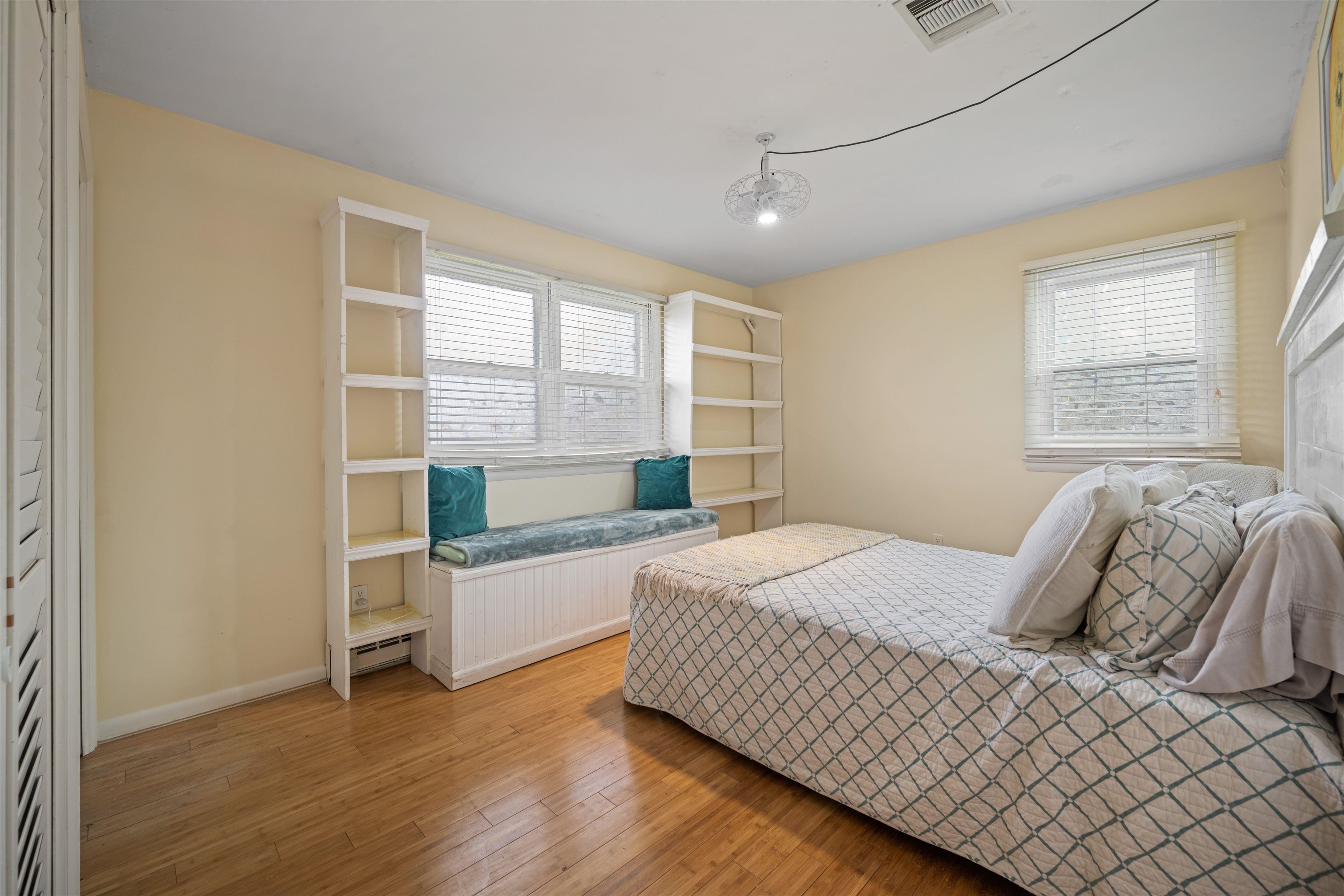 331 Holly Lane Erma, NJ 08204 - Photo 18 of 42 a bedroom with a bed and a window