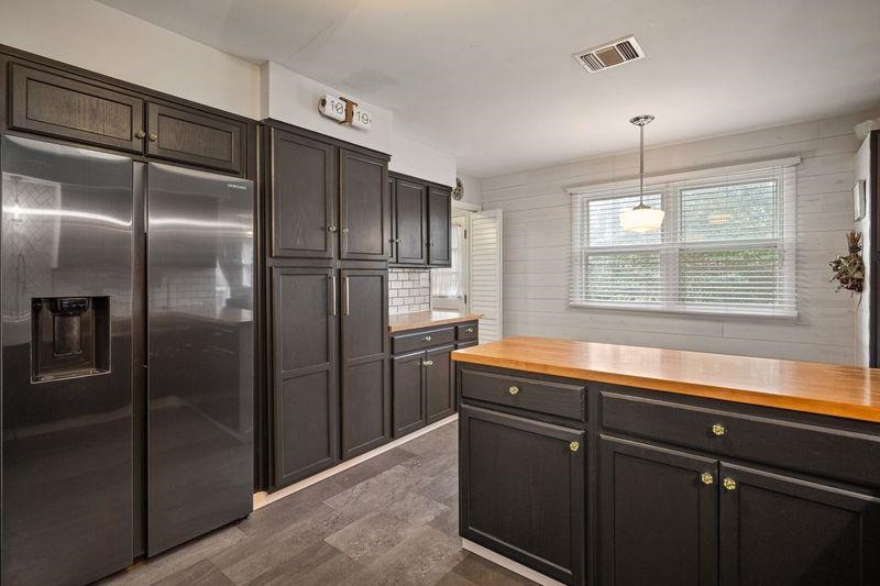 331 Holly Lane Erma, NJ 08204 - Photo 26 of 42 a kitchen with stainless steel appliances granite countertop a refrigerator and a sink