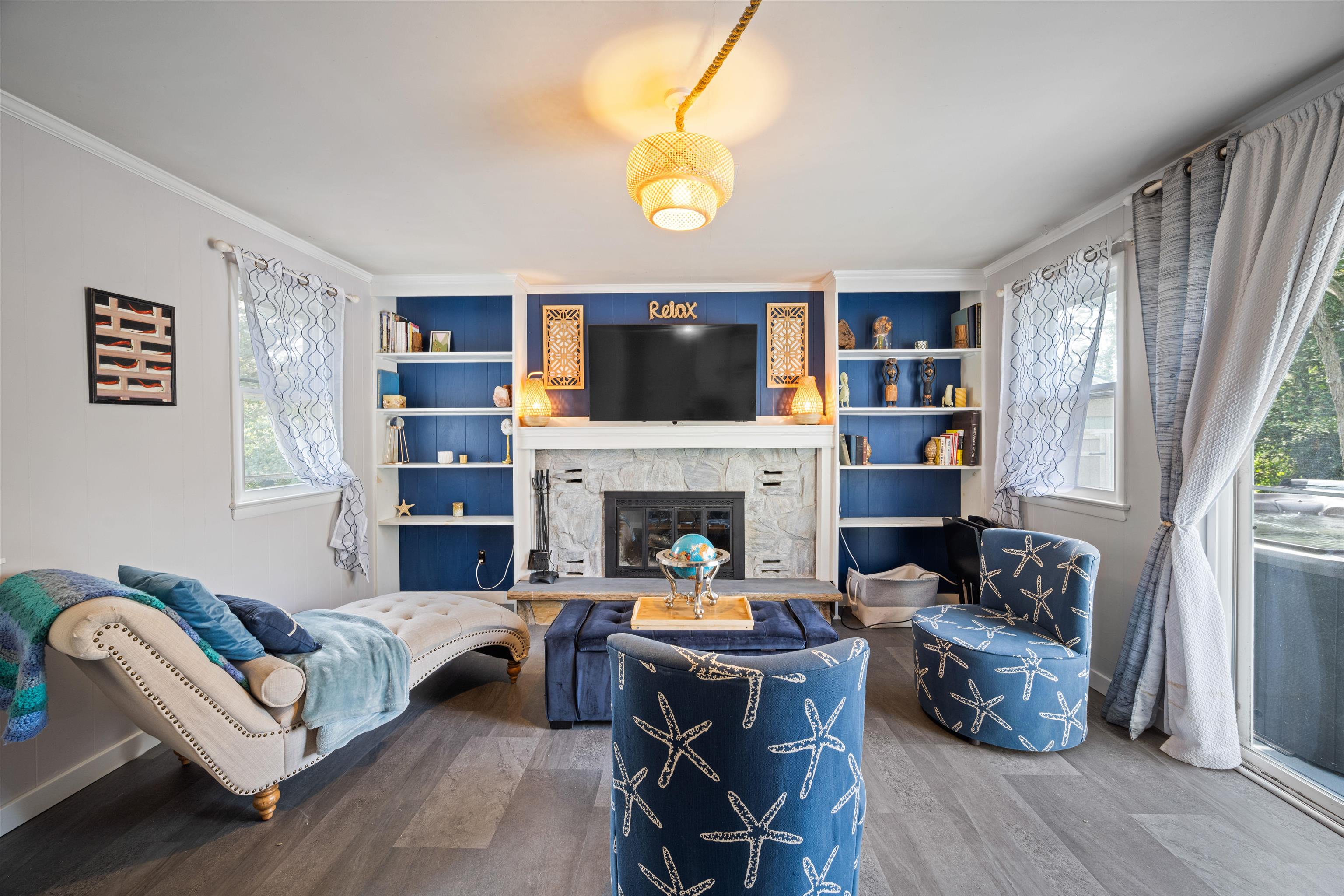 331 Holly Lane Erma, NJ 08204 - Photo 29 of 42 a living room with furniture and a flat screen tv
