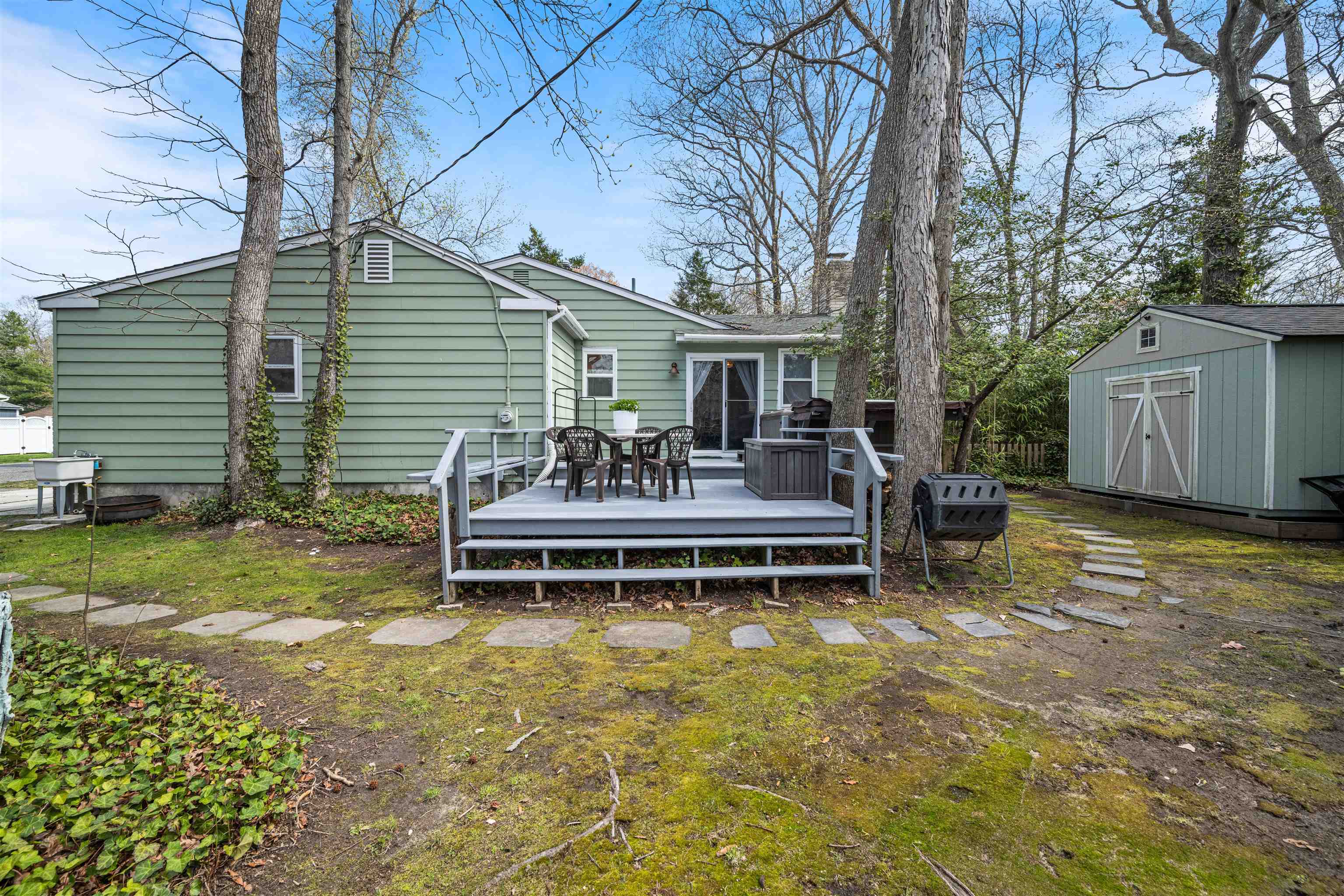 331 Holly Lane Erma, NJ 08204 - Photo 36 of 42 a view of a chair and table in backyard of the house