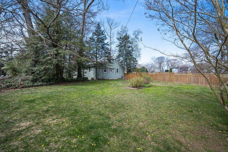 331 Holly Lane Erma, NJ 08204 - Photo 39 of 42 a view of a backyard with large trees