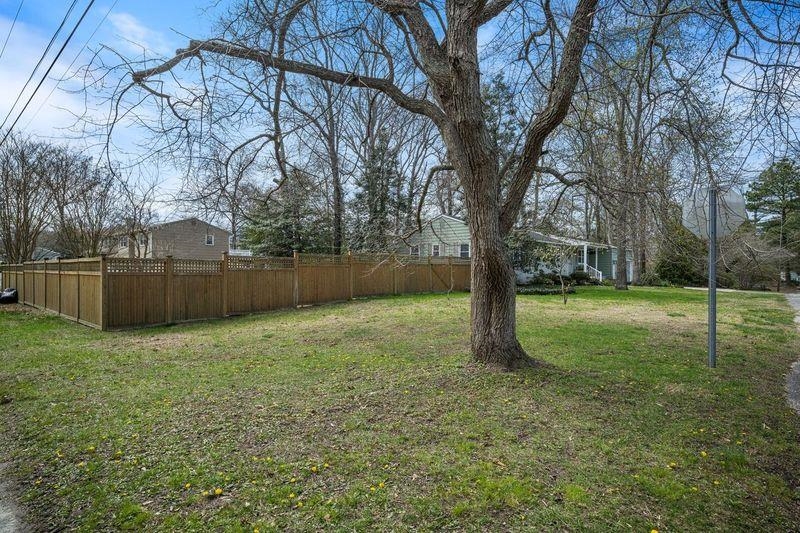 331 Holly Lane Erma, NJ 08204 - Photo 5 of 42 a view of a yard with a tree