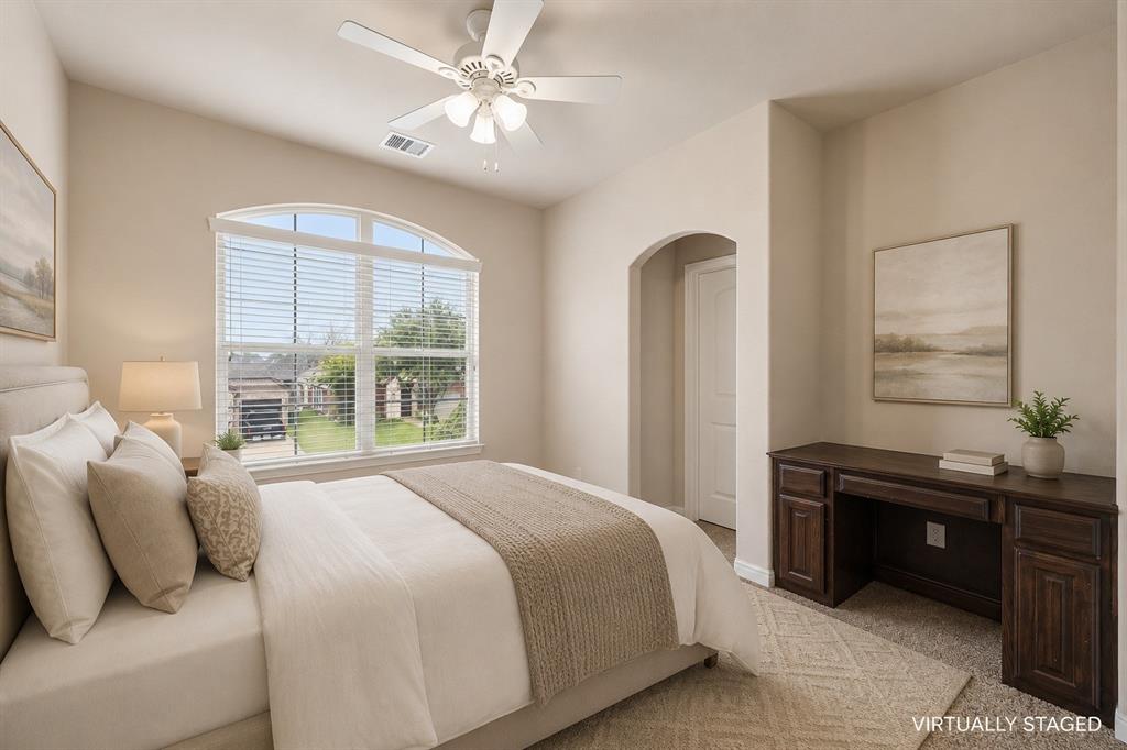 1014 Dunhill Lane Forney, TX 75126 - Photo 22 of 38 This is bedroom #3 with a built in desk and walk in closet.