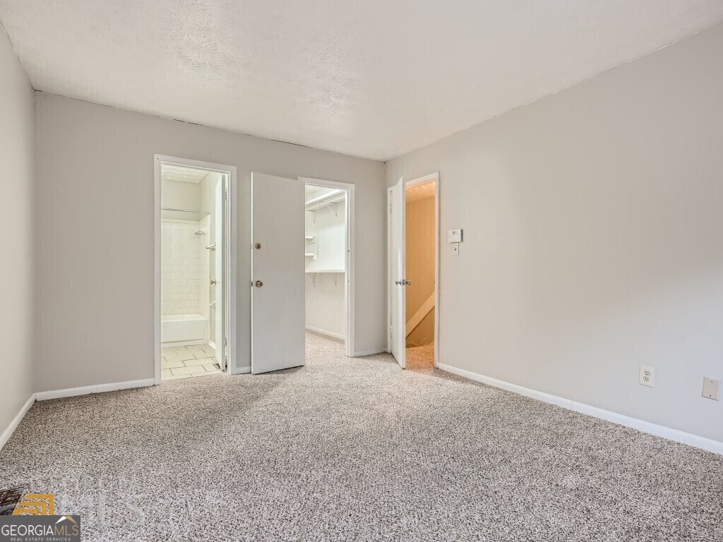 967 Pine Hollow Road Austell, GA 30168 - Photo 17 of 26 a view of an empty room and closet area