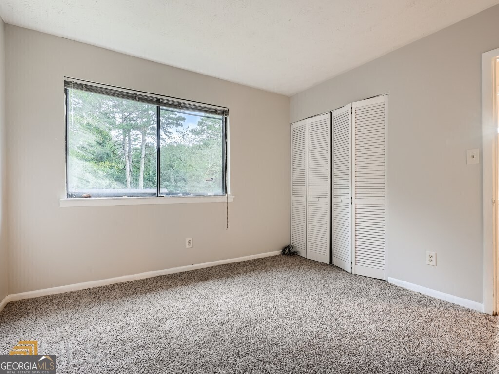 967 Pine Hollow Road Austell, GA 30168 - Photo 25 of 26 a view of an empty room with a window