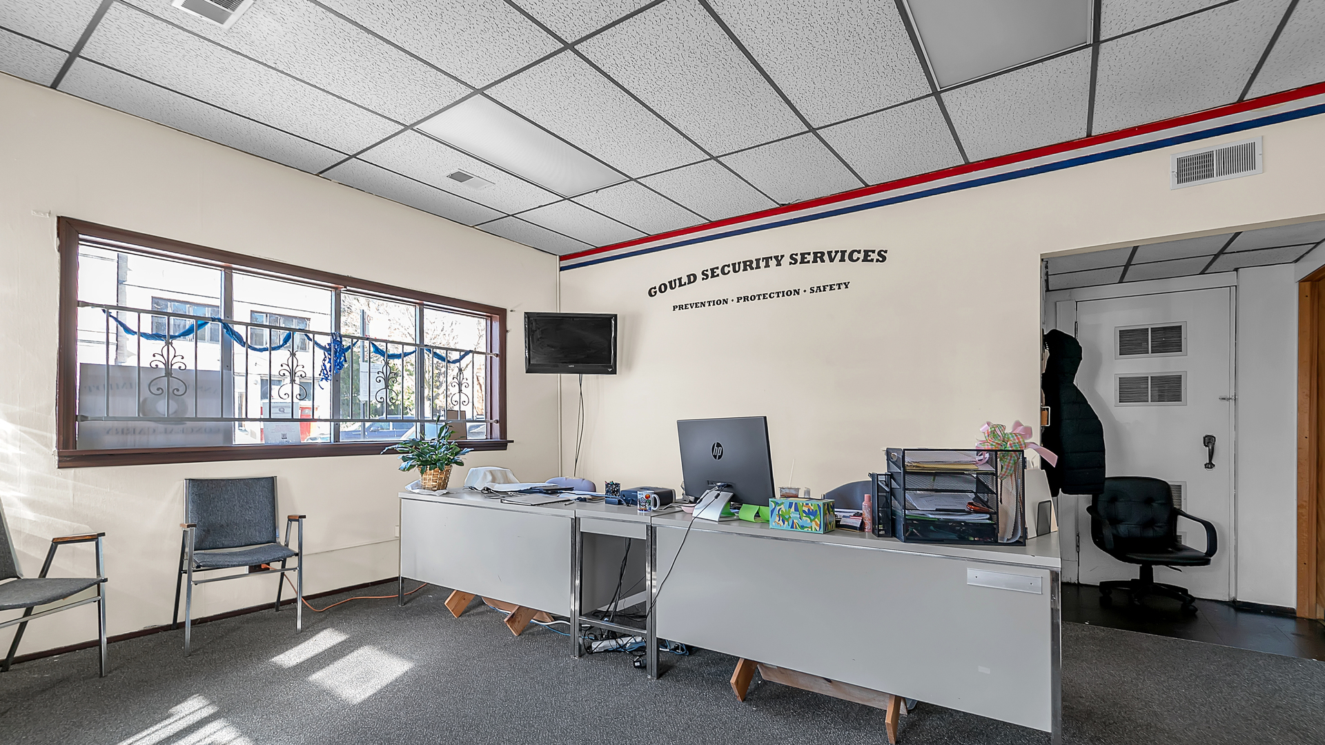 13257 South Baltimore Avenue Chicago, IL 60633 - Photo 20 of 32 a room with furniture a flat screen tv and a window