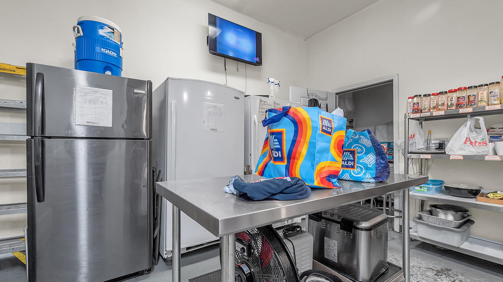 13257 South Baltimore Avenue Chicago, IL 60633 - Photo 22 of 32 a kitchen with stainless steel appliances granite countertop a refrigerator and a dining table