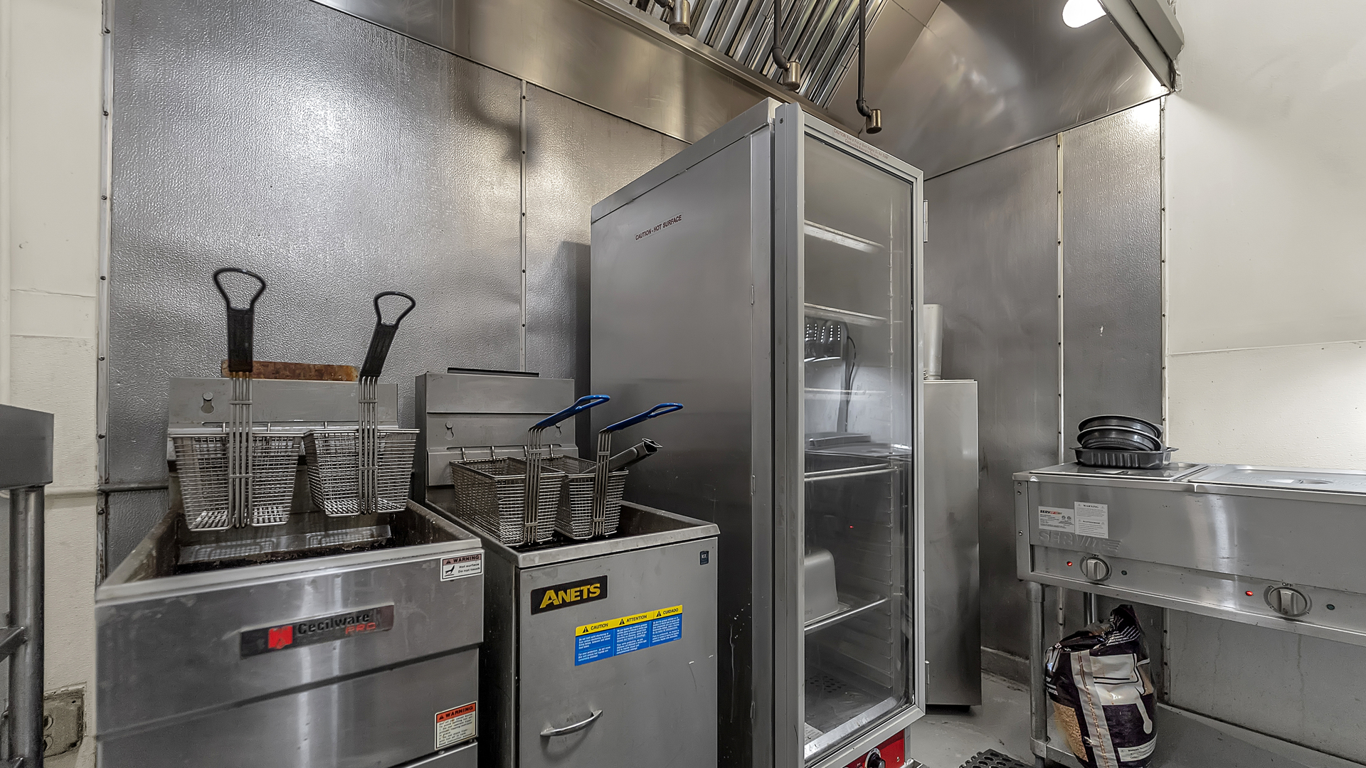 13257 South Baltimore Avenue Chicago, IL 60633 - Photo 23 of 32 a kitchen with refrigerator a washer and dryer