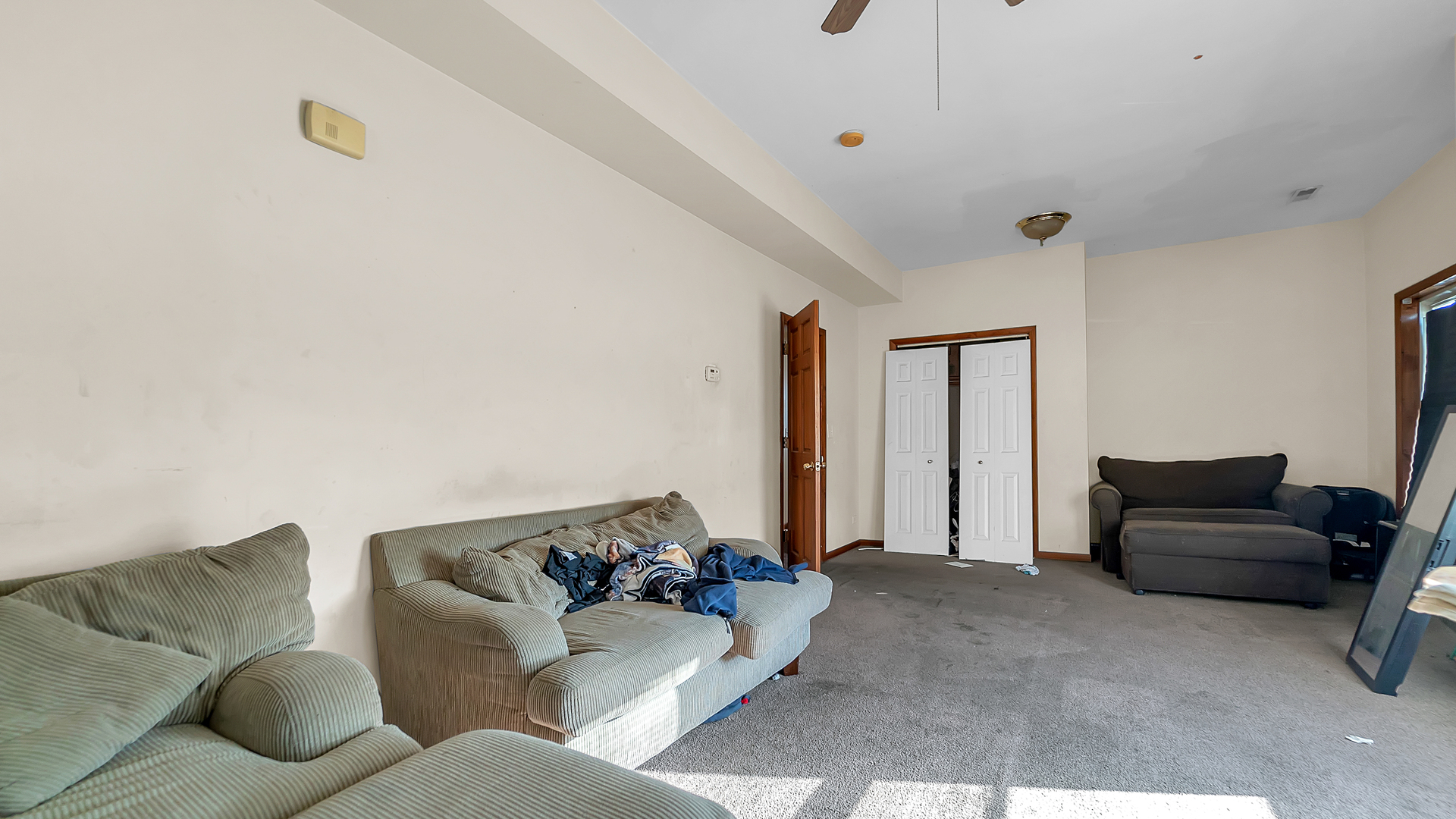 13257 South Baltimore Avenue Chicago, IL 60633 - Photo 26 of 32 a living room with furniture and a window
