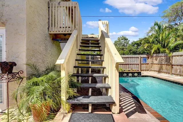 a view of balcony with furniture
