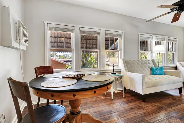 a living room with furniture and a table