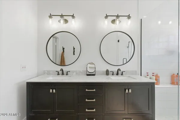a view of a hallway with closet and a couch