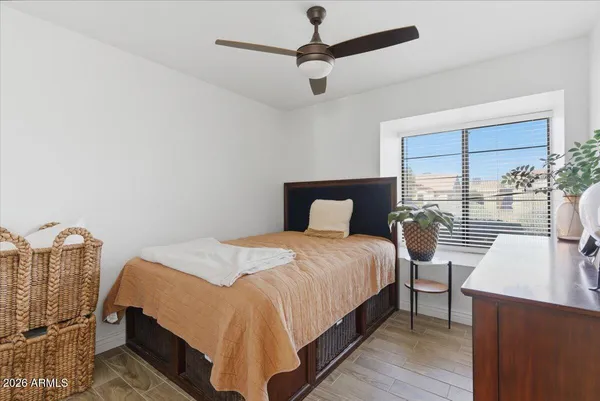a view of a house with garden and a chair
