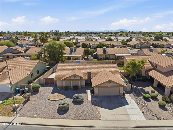 an aerial view of a house with a outdoor space