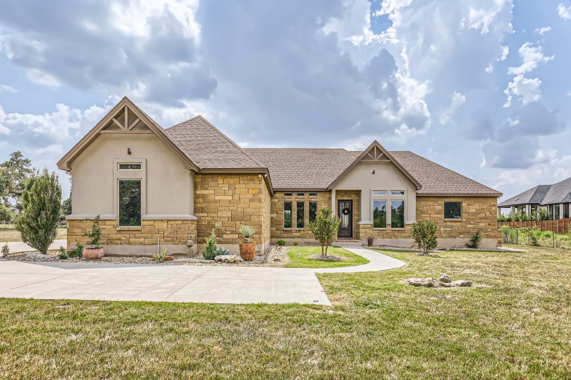 100 Gabgrove Court Georgetown, TX 78633 - Photo 1 of 1 a front view of a house with a yard