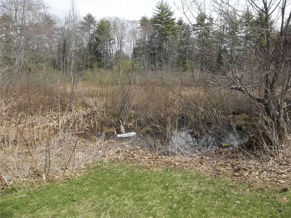 596 Patricktown Road Somerville, ME 04348 - Photo 10 of 12 Back yard. Small pond.