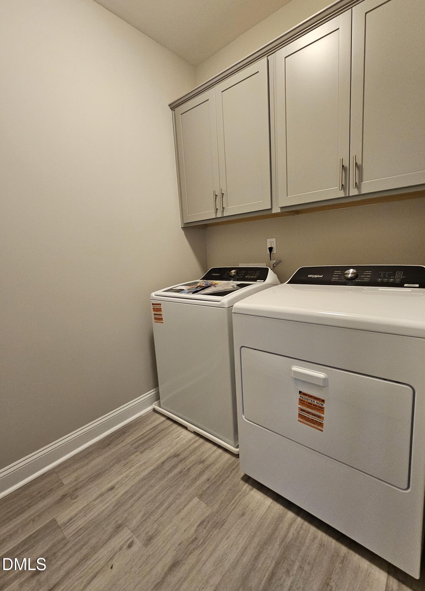 7994 Humie Olive Road Apex, NC 27502 - Photo 14 of 14 a view of cabinets with wooden floor