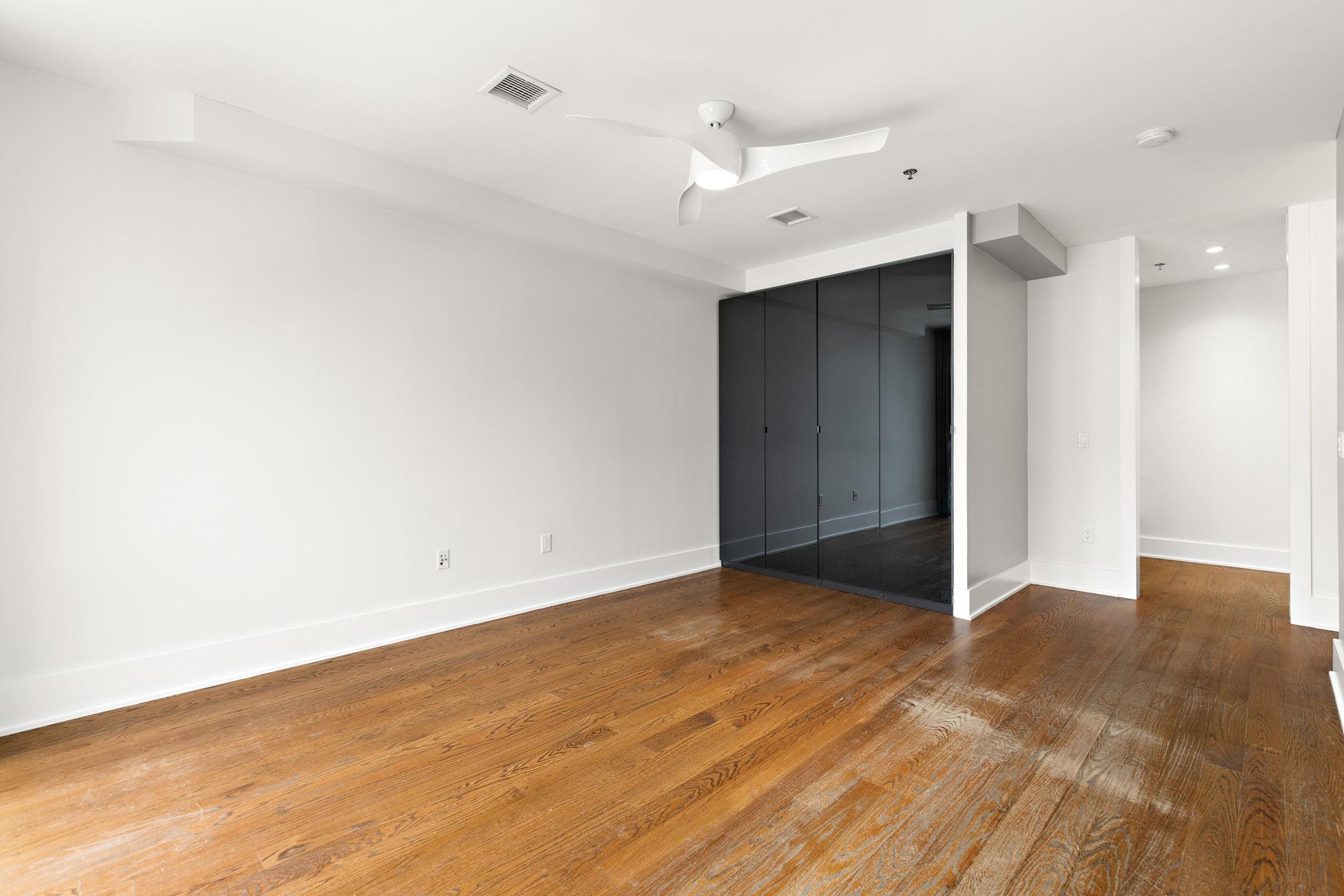 89 Jefferson Street, Unit 4B Hoboken, NJ 07030 - Photo 9 of 16 a view of an empty room