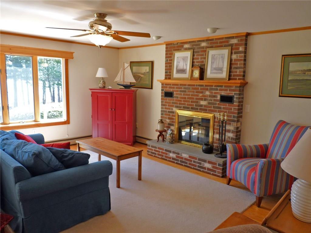 811 Nicolin Road Ellsworth, ME 04605 - Photo 17 of 35 Living room with lake views