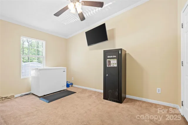 a living room with a flat screen tv